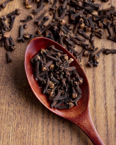 high-angle-clove-wooden-spoon